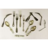 Twelve folding fork and spoons,19th and 20th century,including two French silver, one German silver,