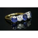 A five stone graduated sapphire and diamond ring,with three circular mixed cut sapphires and two old