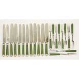 Twelve green-stained ivory knives and ten green-stained ivory forks,late 18th century,the forks with