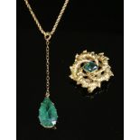 A Victorian green paste set gold knot brooch/pendant, with a lozenge-shaped green paste,