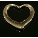 A gold Tiffany & Co. open heart pendant,designed by Elsa Peretti. Tested as approximately 18ct gold.