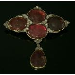 A Georgian garnet and diamond lozenge-shaped stomacher brooch,with pendant drop. Four oval