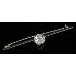 A single stone diamond bar brooch,with an old European cut diamond, estimated as approximately 2.