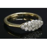 An Edwardian gold, diamond set, lozenge-shaped diamond cluster ring, with old Swiss and old eight