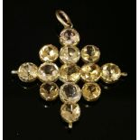 A Georgian gold topaz and citrine cruciform lozenge-shaped pendant,composed of assorted circular