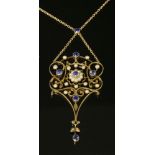 An Edwardian sapphire and split pearl pendant, c.1910,with a flat wire cartouche-shaped frame, a