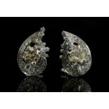 A pair of diamond set spray earrings, c.1950,with an old brilliant cut diamond, four claw set to the