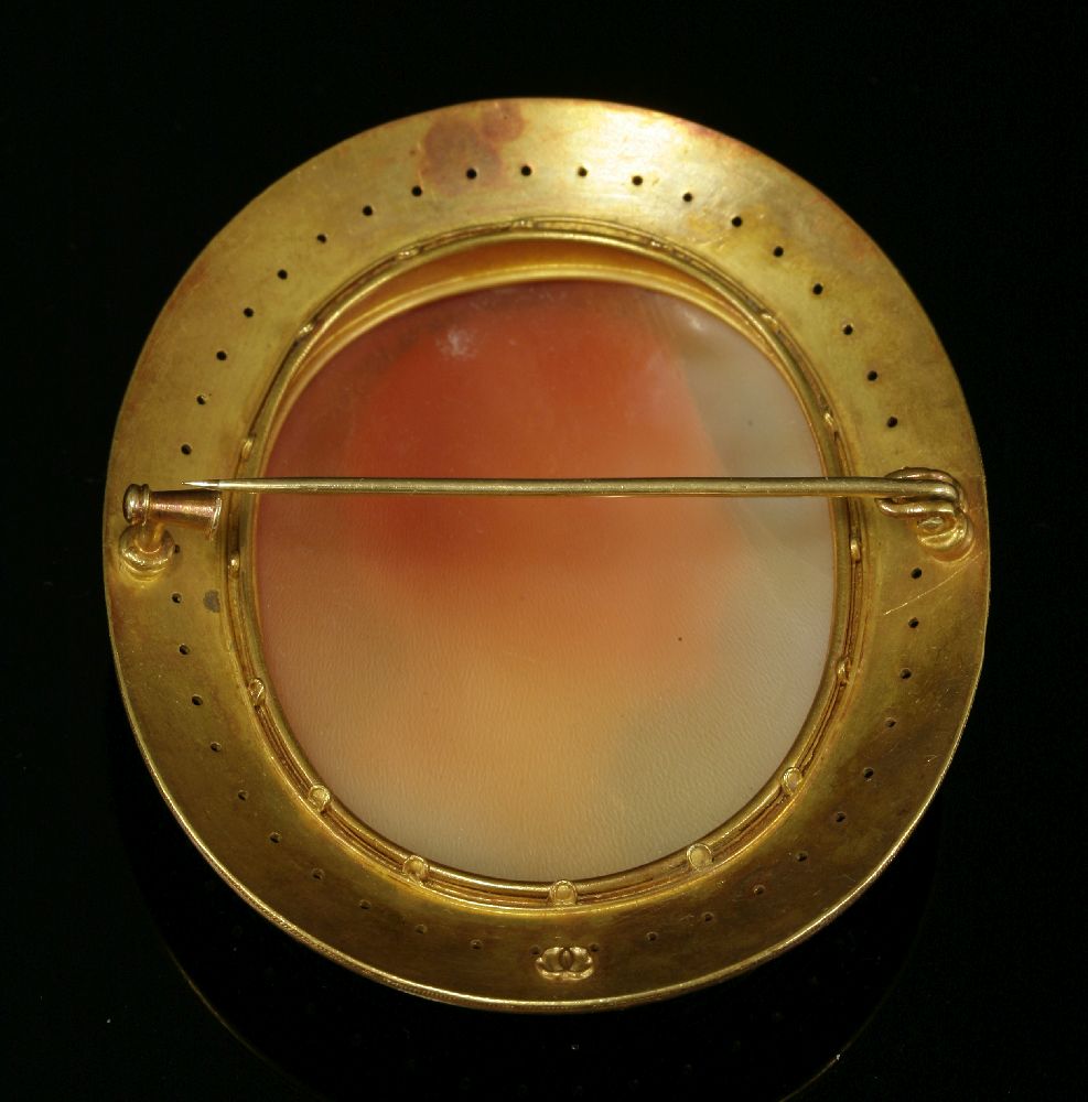 An Archaeological Revival gold shell cameo brooch, c.1865,by Castellani. The oval carved shell cameo - Image 4 of 6