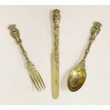 A Victorian silver gilt knife, table fork and spoon,Hunt & Roskell Ltd., London, 1897,rich figure