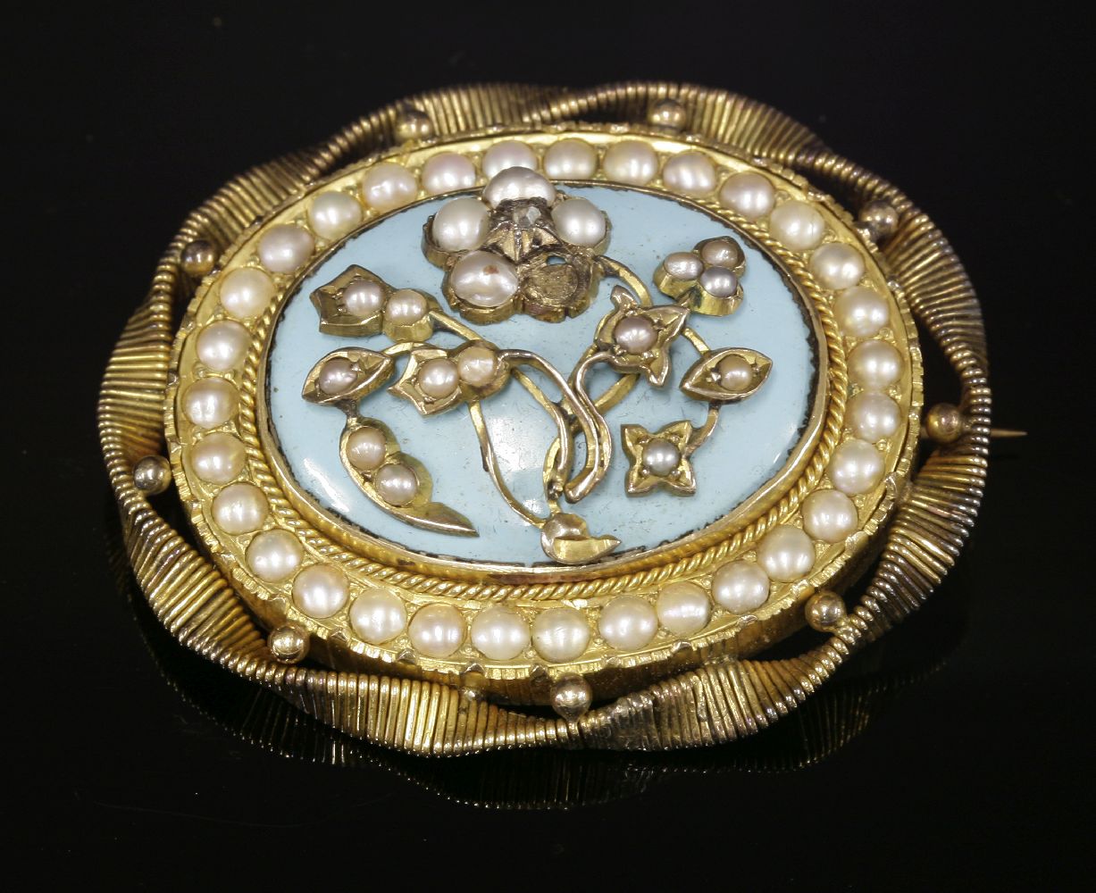 A Victorian diamond, split pearl and enamel brooch,with a central forget-me-not set with a rose