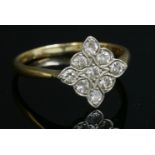 An Art Deco diamond set lozenge cluster ring,with nine Swiss cut and eight cut diamonds,