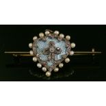 An Edwardian gold, diamond, seed pearl and enamel heart-shaped pendant, later mounted as a bar