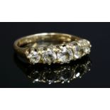An Edwardian five stone graduated boat-shaped diamond ring,with graduated old European cut diamonds,