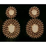 A pair of rose gold, rose quartz, earrings,by Carla Amorim, with a detachable pendant drop. Each