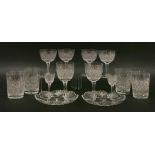 A suite of Webb glassware,comprising of three sizes of glasses,twelve,13cm high,twelve, one