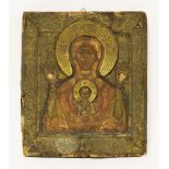 A Russian icon,19th century, the mother and Christ child with engraved brass halos within a
