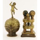 An Italian brass holy water stoop and cover,19th century, with a dancing child on a domed cover,20cm
