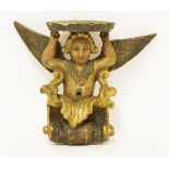 A carved gilt and polychrome decorated wall bracket, 18th century, modelled as a winged putto,26cm
