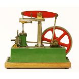 A Stuart live steam single cylinder beam engine, in green livery on an hardwood base, 35cm long