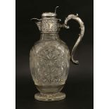 An Edward VII silver-mounted cut glass claret jug,Walter & Charles Sissons, Sheffield, 1909, ovoid