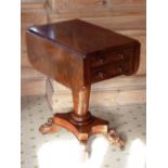 A late Regency/early Victorian mahogany Work Table, two frieze drawers flanked by drop-leaves,