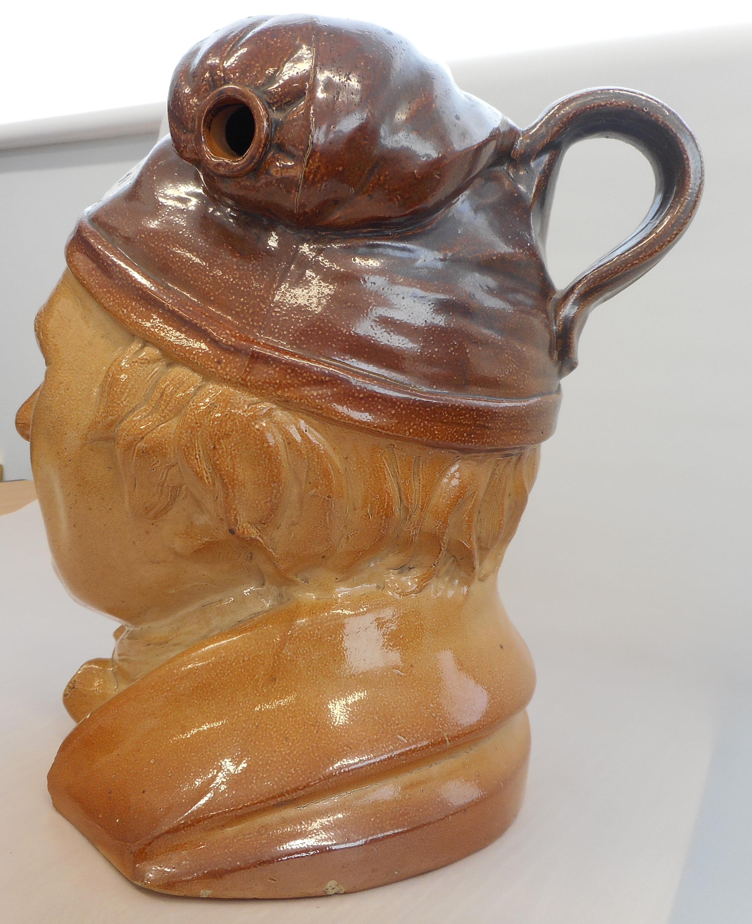 A large 19th century salt glaze stoneware Flask modelled as a Dickensian type character, - Image 3 of 4