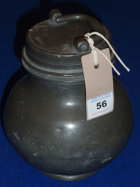 A heavy 19th century pewter Flask and Cover of squat ovoid form,