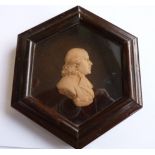An hexagonal framed 18th century Wax Portrait miniature "Alex Waugh A.M.