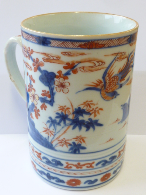 An 18th Century Chinese porcelain Tankard of cylindrical form hand decorated with birds amongst