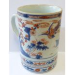 An 18th Century Chinese porcelain Tankard of cylindrical form hand decorated with birds amongst