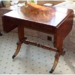 A good and unusual Regency period mahogany Sofa Table of diminutive proportions,