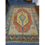 A large Kazak style Carpet,