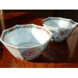 A pair of Kangxi period octagonal porcelain Bowls hand decorated in enamels with flowers etc.