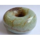 A 19th century Chinese Bi, the celadon stone with russet marking and of good surface polish, 5.