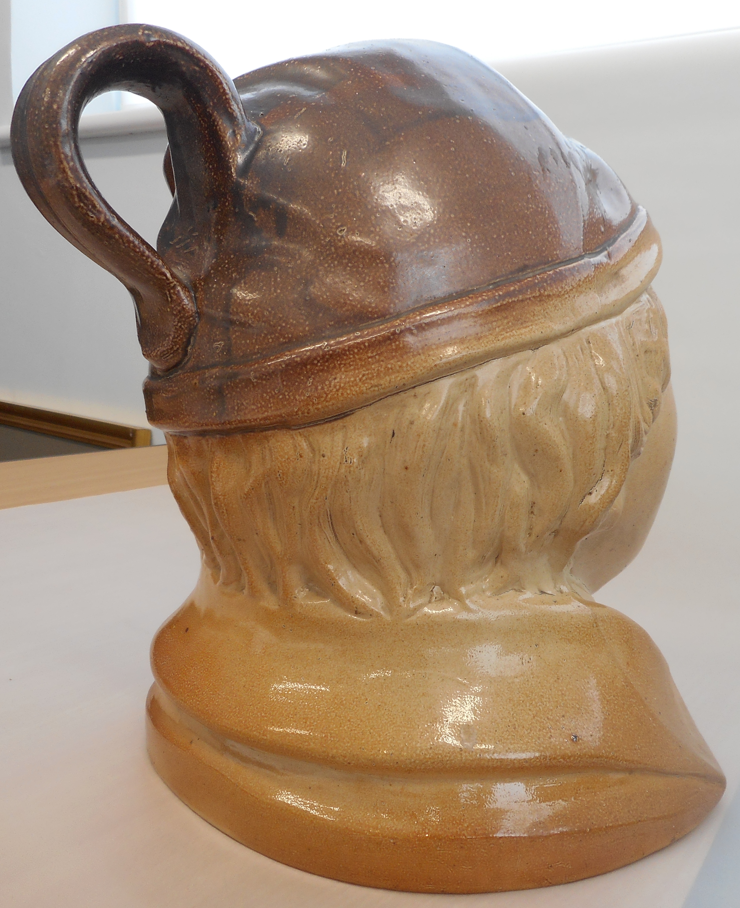 A large 19th century salt glaze stoneware Flask modelled as a Dickensian type character, - Image 4 of 4