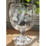 A large Rummer style glass, hand engraved and etched with ears of corn, leaves, flowers etc.