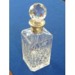 A fine cut crystal Spirit Decanter having a mounted hallmarked silver collar, makers mark G & Co.