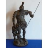 A large and heavy well patinated bronze Sculpture of a Roman Gladiator slaying an attacking lion,