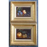 A pair of still life Oil Paintings by Szabo, depicting fruit on an oak shelf, signed lower left,