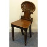 ADDED LOT A Regency period mahogany Hall Chair having shell shaped back