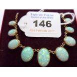 A fine quality 9-carat gold opal Necklace CONDITION REPORT: All appears reasonable