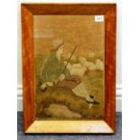 A mid-19th century satin birch framed and glazed Needlework depicting a Shepherd seated by water