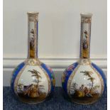 A pair of 19th century German porcelain Bottle Vases typically gilded with floral sprays against a