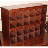 A 19th century mahogany Bank of 24 Pigeonholes, 58.