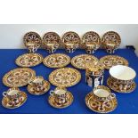 Royal Crown Derby porcelain hand gilded and decorated in the Imari palette comprising six Tea Cups