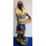 A large 19th century Continental Majolica glaze pottery Blackamoor Figure,