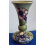 A stunning Moorcroft Vase, a rare piece owing to the band not being decorated in the anemone design,