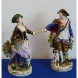 A good pair of late 19th century hand-decorated Chelsea-style porcelain Figures;