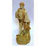 A late 19th century Austrian porcelain Model of a male figure in turban carrying an amphora (damage