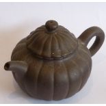 A Chinese melon form Yixing Teapot, four-character mark to underside of base,